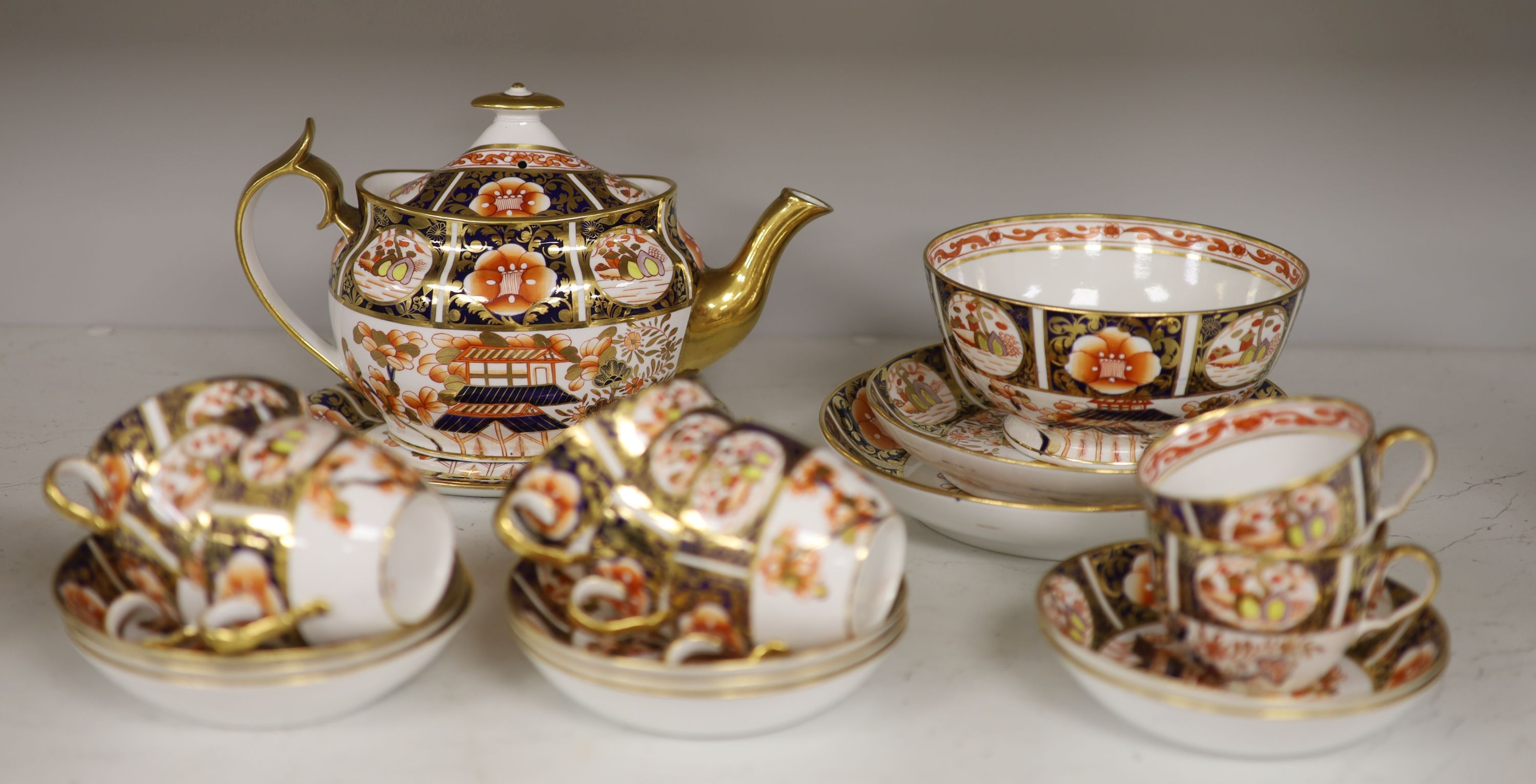 A Spode part tea service painted in imari style with pattern 1956,